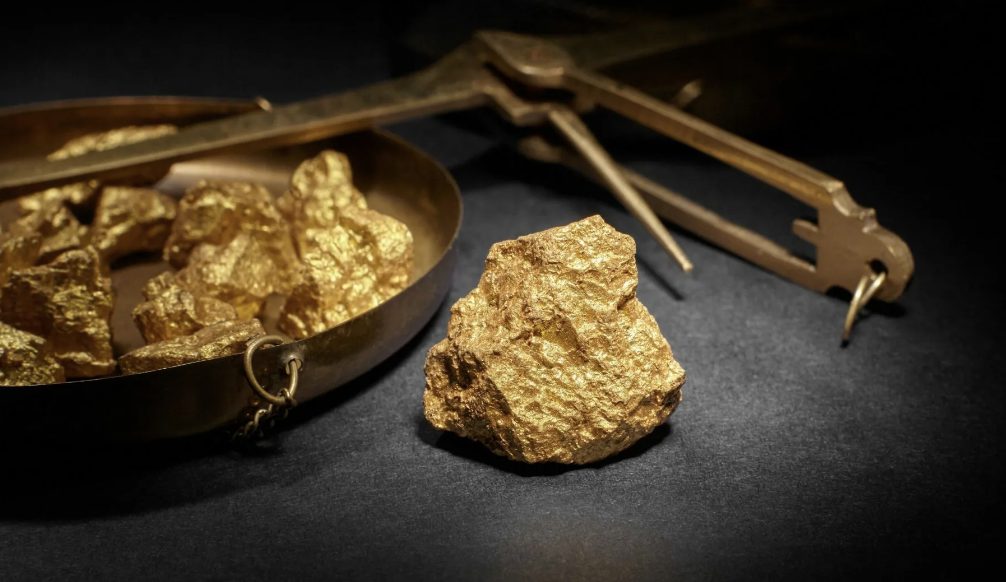 How many grams in ounce of gold?