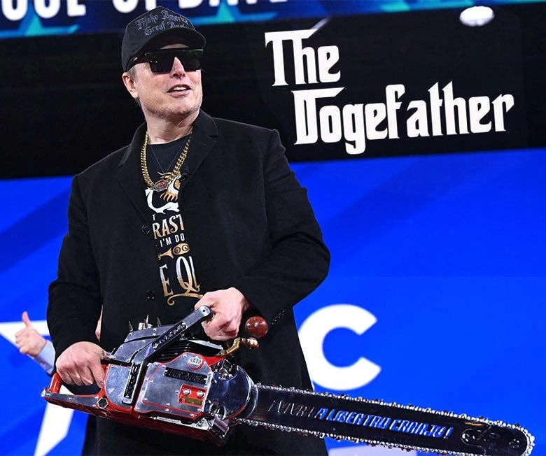 Photo of Elon Musk wielding the chainsaw that Argentine president, Javier Milei gave to him at the Conservative Political Action Conference (CPAC)