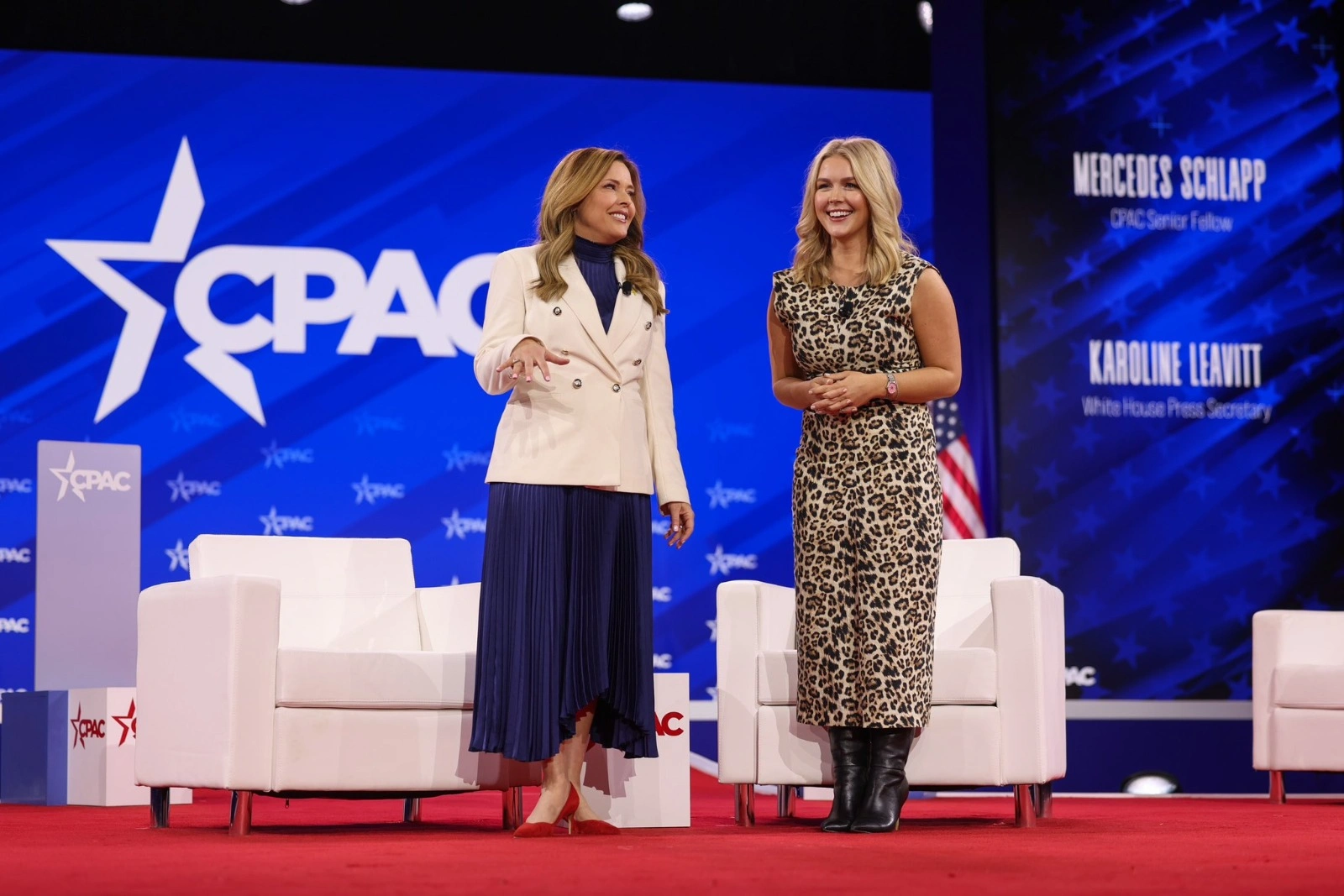 Photo of White House Press Secretary Karoline Leavitt on stage at CPAC with Mercedes Schlapp, Former WH Strategic Senior Advisor for President Trump